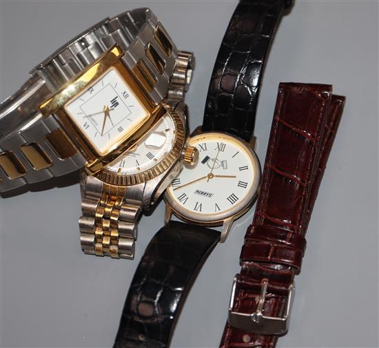 Three assorted wrist watches.